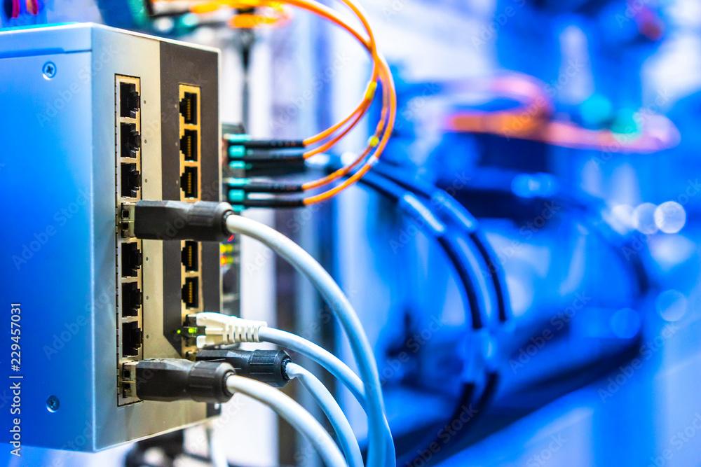 Industrial Ethernet switch with patch cables wiring an automation network